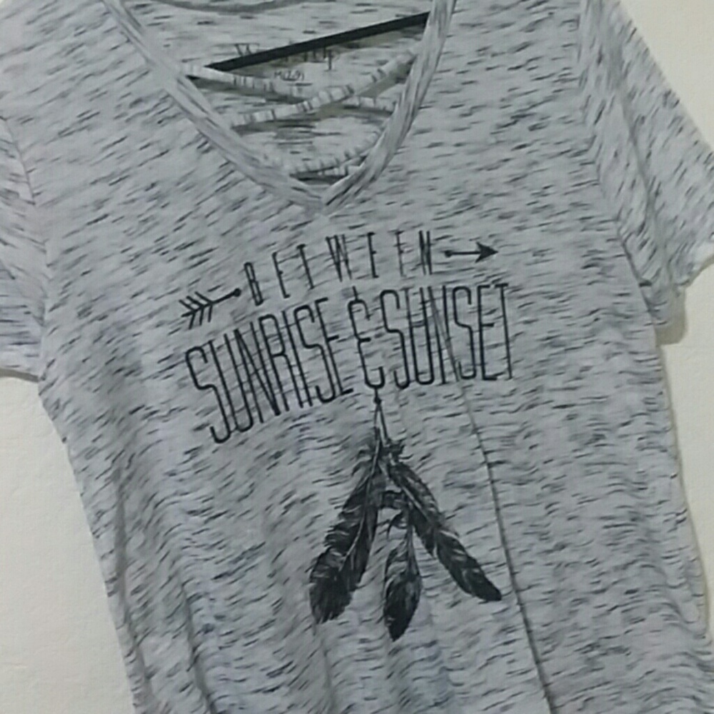 Black and white v neck crossed over chest.